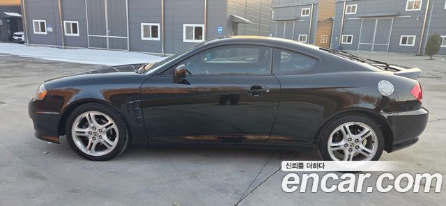 Hyundai Tuscani 2005 — photo 12