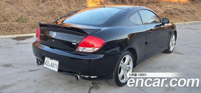 Hyundai Tuscani 2005 — photo 13