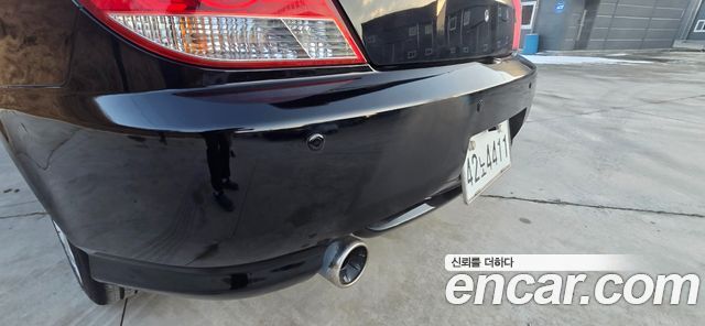 Hyundai Tuscani 2005 — photo 14