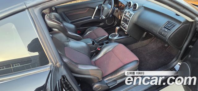 Hyundai Tuscani 2005 — photo 17