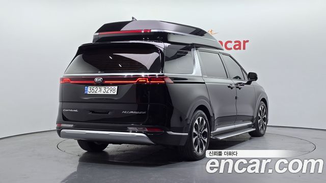 Kia Canival 2021 — photo 2