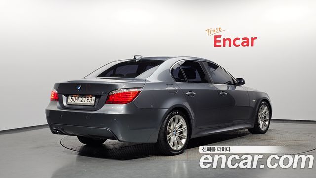BMW 5-Series 2009 — photo 2