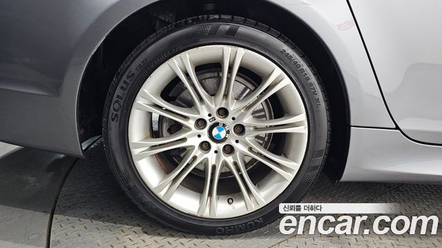 BMW 5-Series 2009 — photo 5