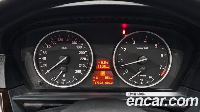 BMW 5-Series 2009 — photo 8