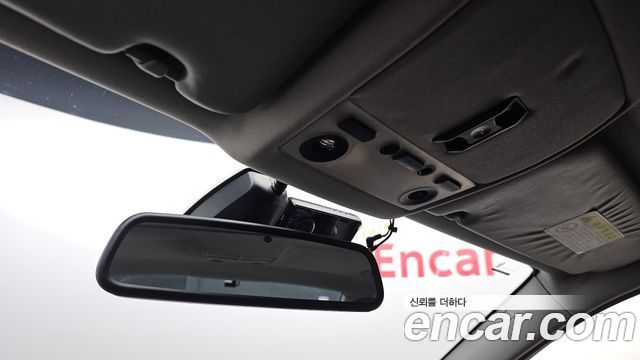 BMW 5-Series 2009 — photo 17