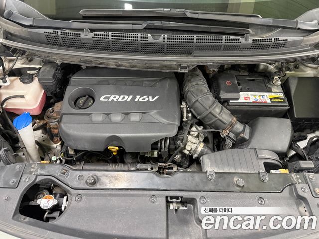 Kia Carens 2014 — photo 15