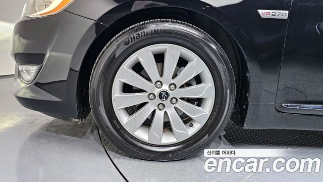 Kia K7 2010 — photo 5