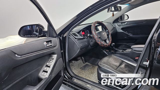 Kia K7 2010 — photo 11