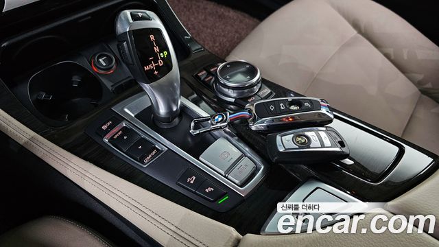 BMW 5-Series 2014 — photo 9