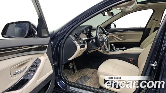 BMW 5-Series 2014 — photo 11