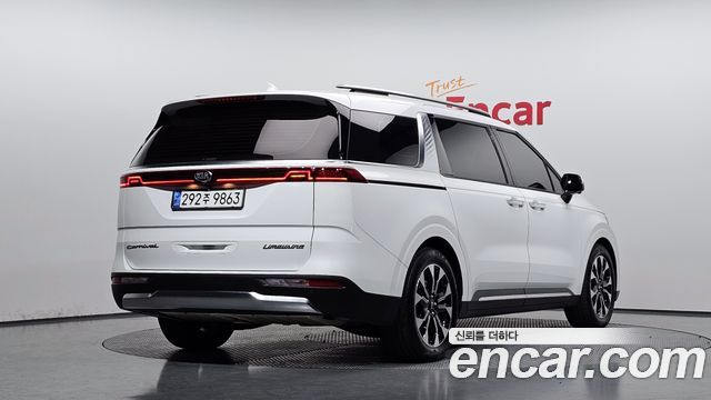 Kia Canival 2021 — photo 2