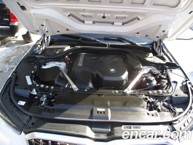 BMW 5-Series 2024 — photo 11