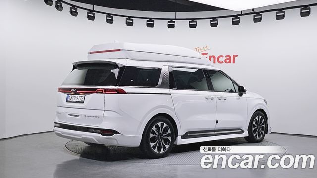 Kia Canival 2023 — photo 2