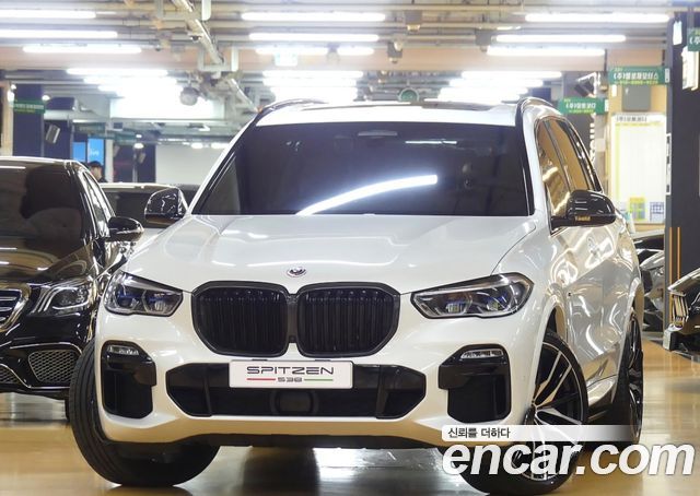 BMW X5 2021 — photo 1