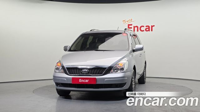 Kia Canival 2010 — photo 3