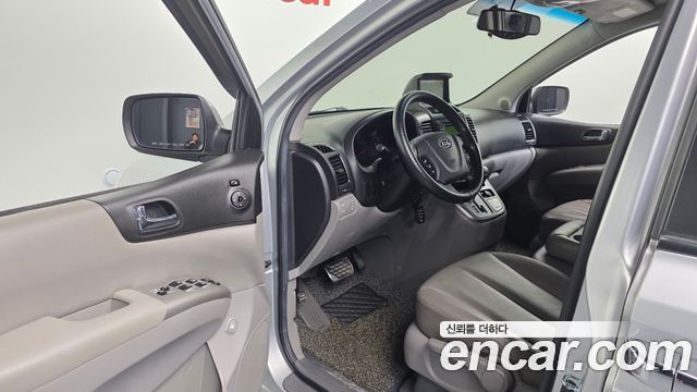 Kia Canival 2010 — photo 10