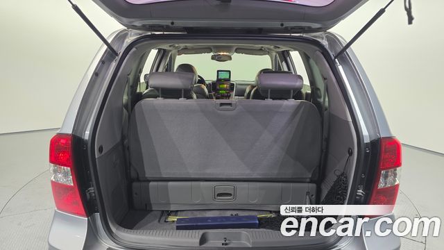 Kia Canival 2010 — photo 20
