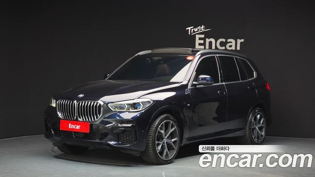 BMW X5 2022 — photo 1
