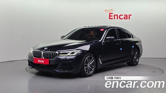 BMW 5-Series 2022 — photo 1