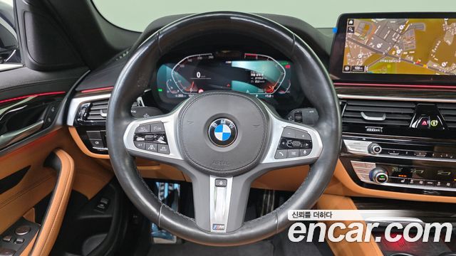 BMW 5-Series 2022 — photo 14