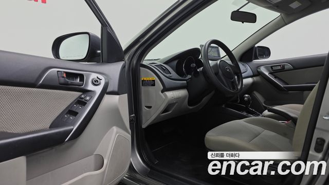 Kia Porte 2013 — photo 11
