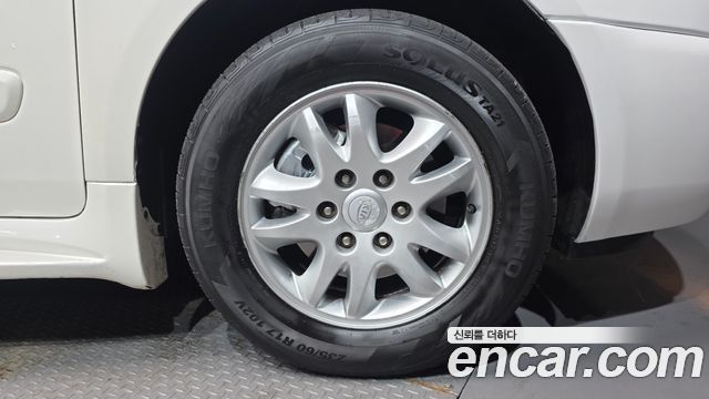 Kia Canival 2011 — photo 5