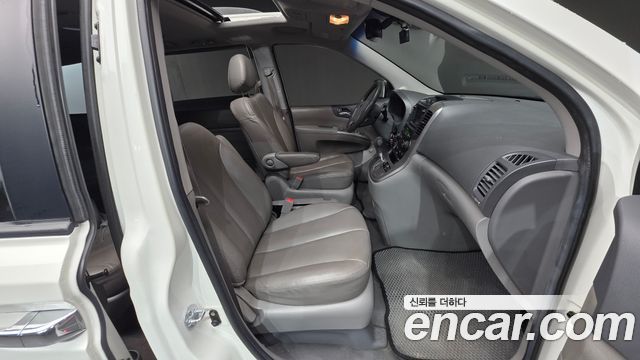 Kia Canival 2011 — photo 10