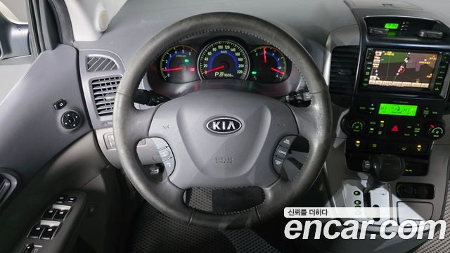 Kia Canival 2011 — photo 14