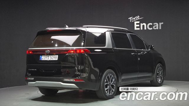 Kia Canival 2021 — photo 2