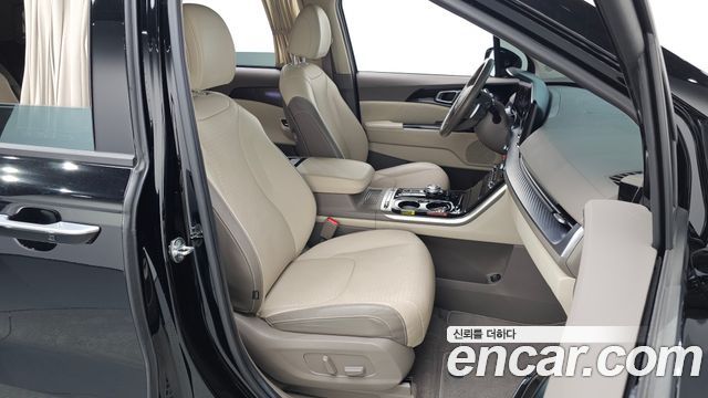 Kia Canival 2023 — photo 11