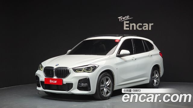 BMW X1 2021 — photo 1