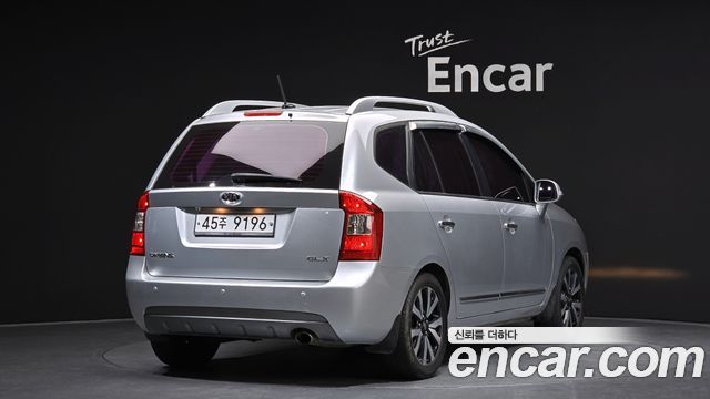 Kia Carens 2011 — photo 2