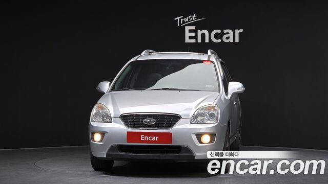 Kia Carens 2011 — photo 3