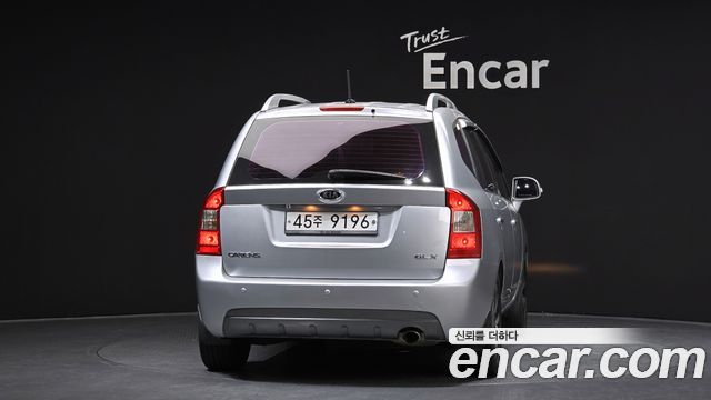 Kia Carens 2011 — photo 4