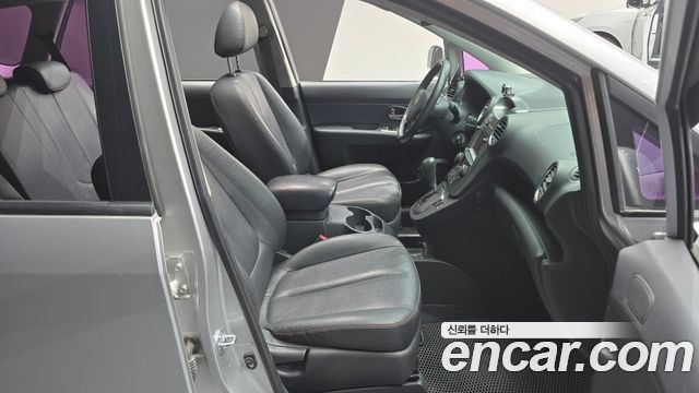 Kia Carens 2011 — photo 10