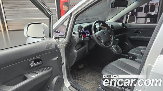 Kia Carens 2011 — photo 11