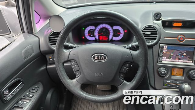 Kia Carens 2011 — photo 14