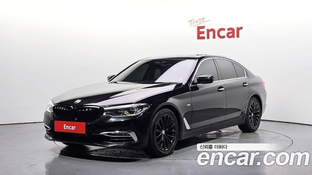 BMW 5-Series 2018 — photo 1