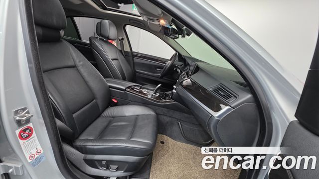 BMW 5-Series 2011 — photo 10