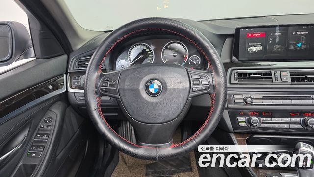 BMW 5-Series 2011 — photo 14
