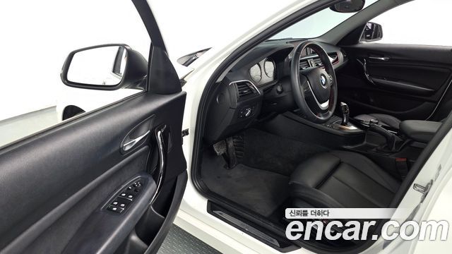BMW 1-Series 2019 — photo 11