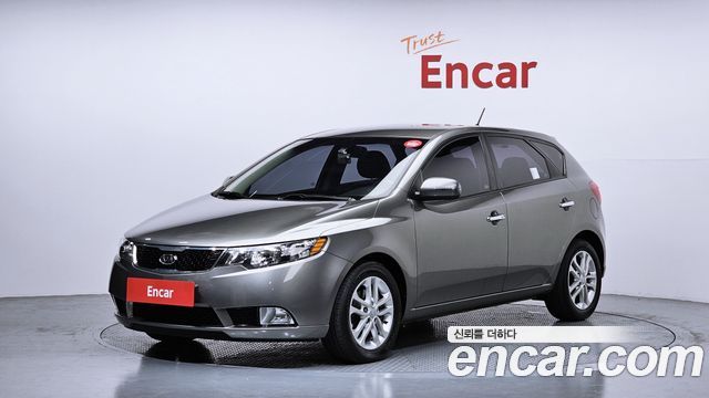 Kia Porte 2011 — photo 1