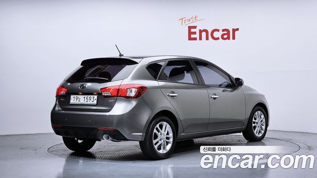 Kia Porte 2011 — photo 2