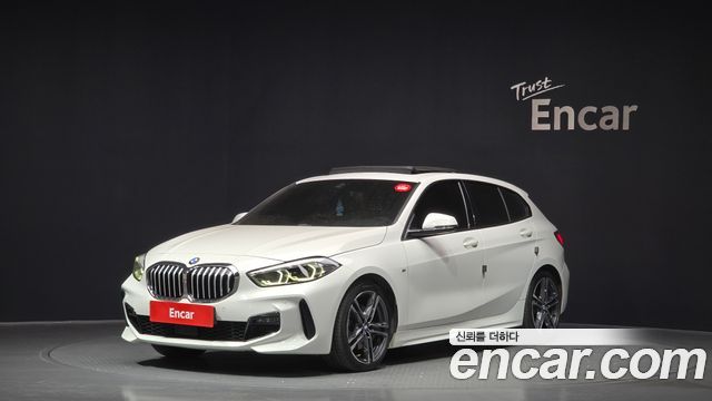 BMW 1-Series 2021 — photo 1