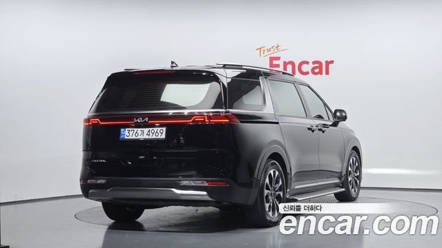 Kia Canival 2023 — photo 2