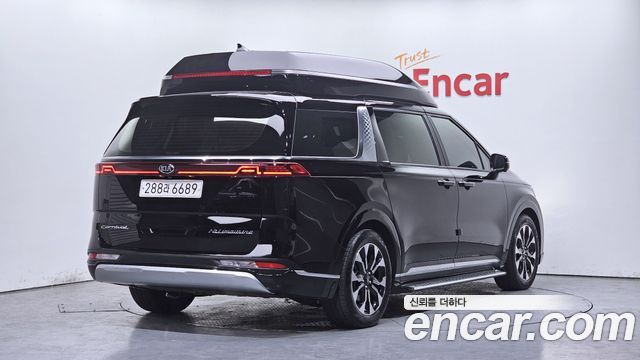 Kia Canival 2021 — photo 2