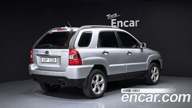 Kia Sportage 2009 — photo 2