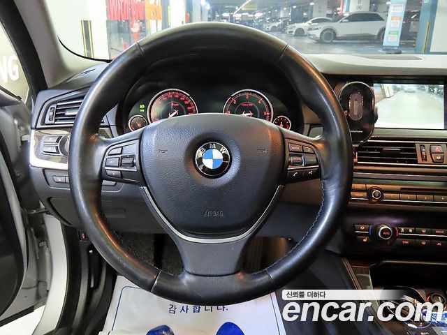 BMW 5-Series 2014 — photo 11