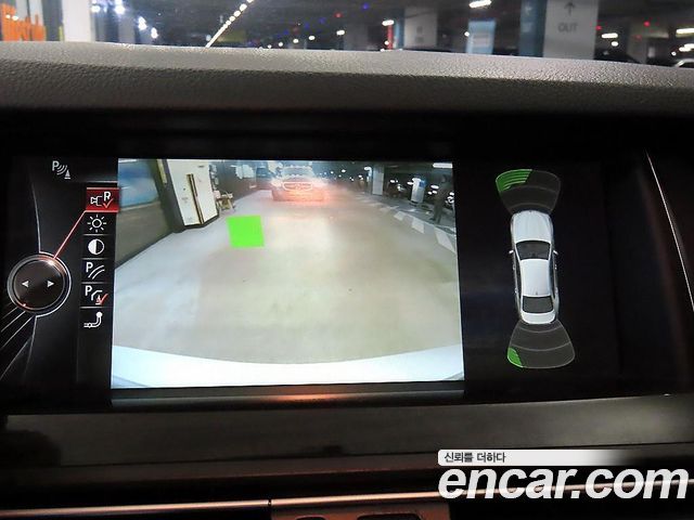 BMW 5-Series 2014 — photo 14