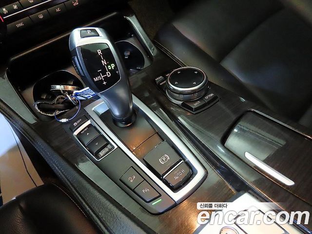 BMW 5-Series 2014 — photo 19